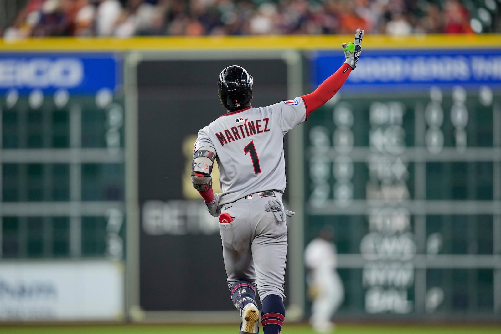 Cleveland Guardians' Angel Martínez celebrates after hitting a home run against the Houston Astros during the first inning of a baseball game Wednesday, July 9, 2025, in Houston. (AP Photo/David J. Phillip)
