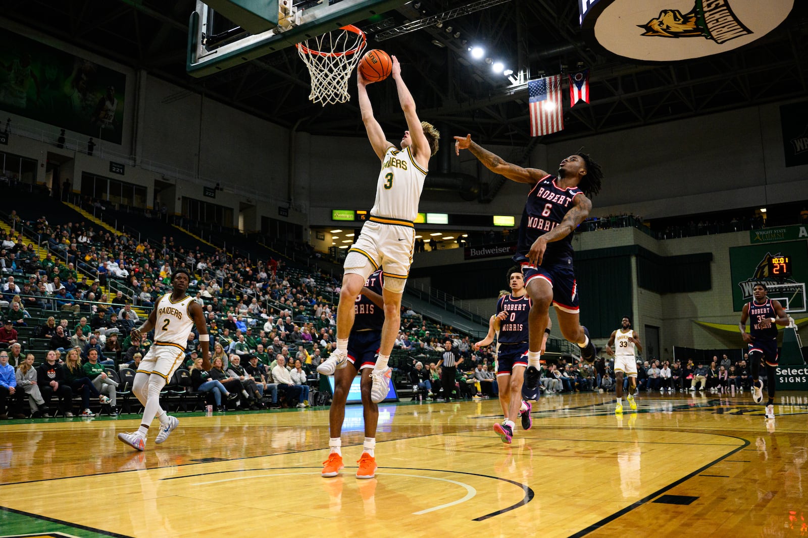 Wright State's Dom Pangonis leaps for a dunk during their game against Robert Morris University on Sunday, Feb. 22, 2026 at the Nutter Center. The Colonials won 81-68. JEREMY MILLER / CONTRIBUTED PHOTO