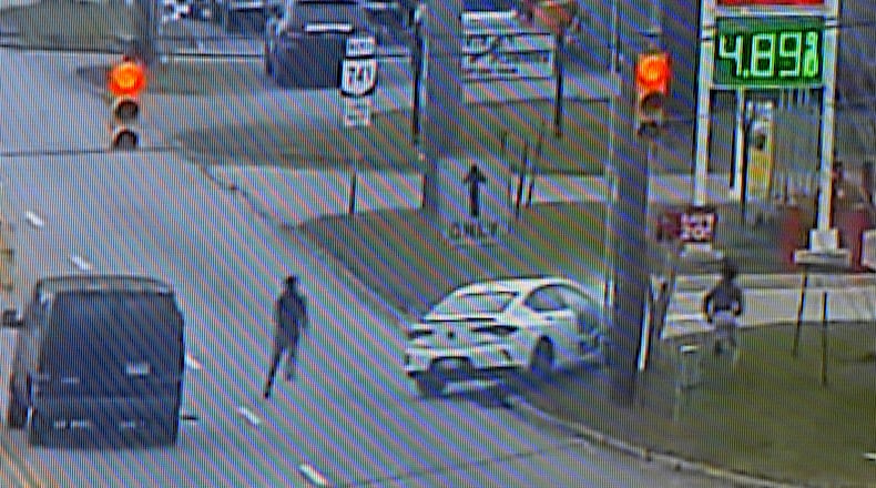 The occupants jumped from a stolen car after a brief pursuit down Dorothy Lane in Moraine, Monday, Dec 12, 2022. Three men were arrested. MARSHALL GORBY\STAFF