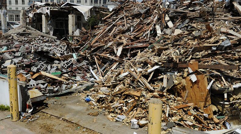 The Columbus-based Windsor Company is tearing down the former Midwest Tool & Engineering Co. building Thursday, May 11, 2023 located at 116 Webster Street to make way for a new apartment building, which will have 102 residential units and 4, 750 square feed of ground floor retail space. MARSHALL GORBY\STAFF
