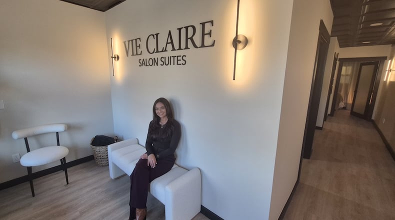 Springboro native Katrina Abbott is bringing "elevated beauty" and self-care to her hometown with her new studio, Vie Claire Salon Suites. MICHAEL KURTZ / STAFF