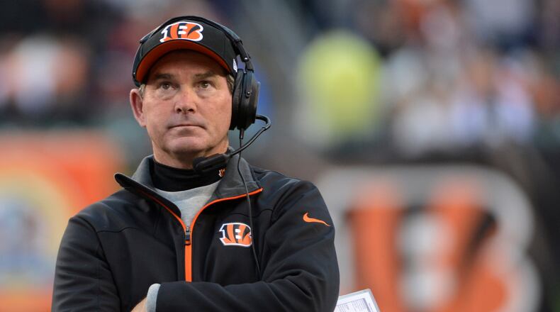 Cincinnati Bengals defensive coordinator Mike Zimmer watches in the second half of an NFL football game against the Dallas Cowboys, Sunday, Dec. 9, 2012, in Cincinnati. (AP Photo/Michael Keating)
