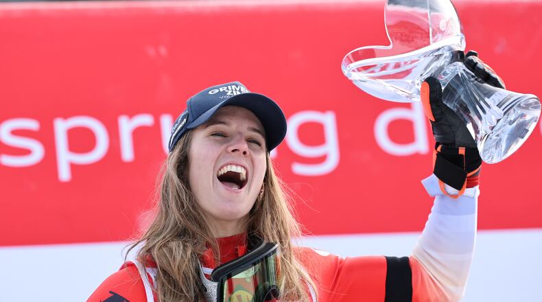 Switzerland's Camille Rast celebrates after winning an alpine ski, women's World Cup slalom, in Kranjska Gora, Slovenia, Sunday, Jan. 4, 2026. (AP Photo/Marco Trovati)