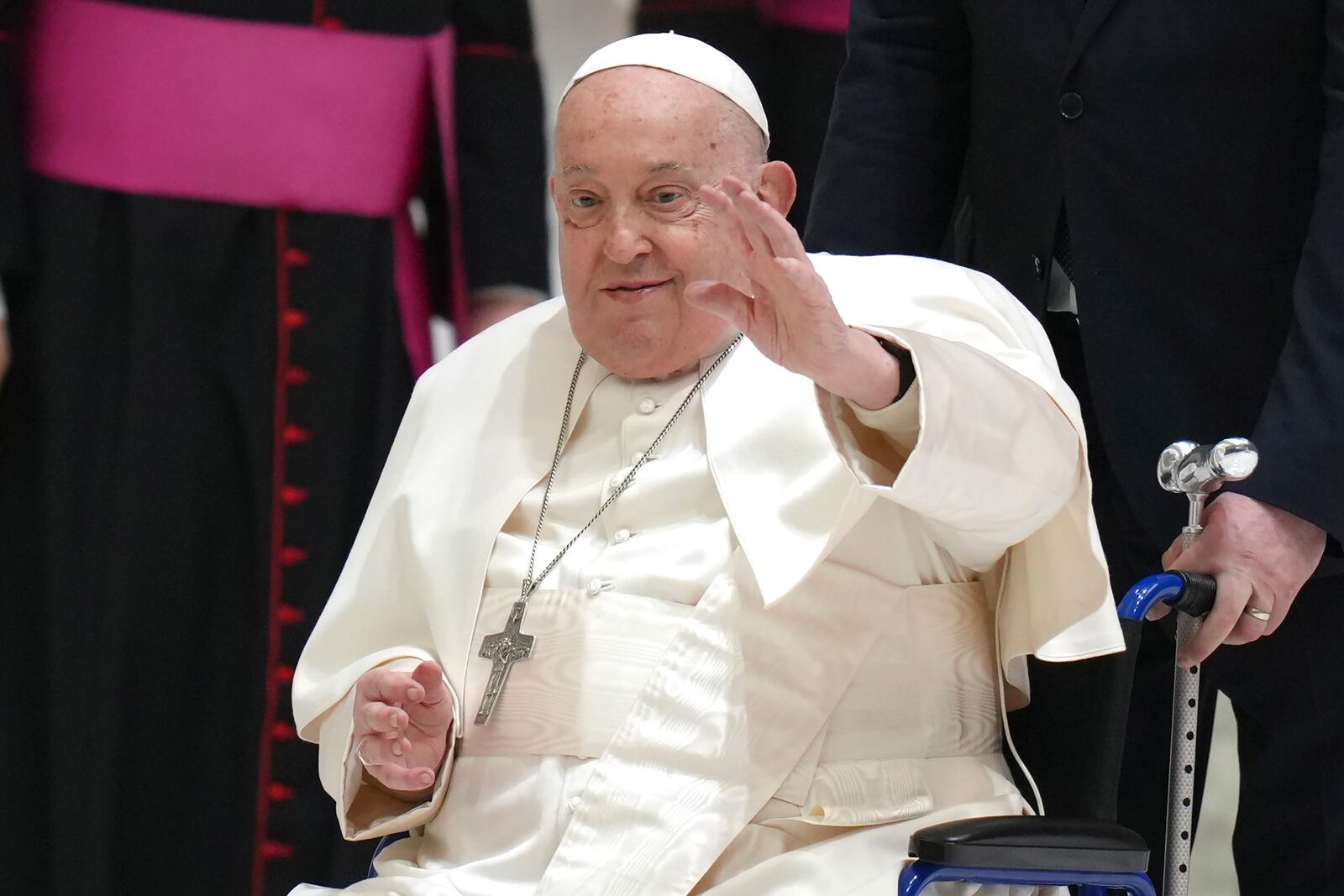 FILE - Pope Francis waves as he arrives for his weekly general audience in the Paul VI Hall, at the Vatican, Wednesday, Feb. 12, 2025. (AP Photo/Alessandra Tarantino, file)