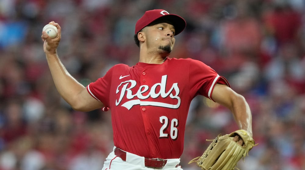 Cincinnati Reds pitcher Chase Burns throws during the second inning of a baseball game against the Los Angeles Dodgers, Monday, July 28, 2025, in Cincinnati. (AP Photo/Carolyn Kaster)
