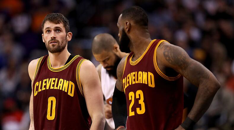 PHOENIX, AZ - JANUARY 08: (L-R) Kevin Love #0 and LeBron James #23 of the Cleveland Cavaliers during the first half of the NBA game against the Phoenix Suns at Talking Stick Resort Arena on January 8, 2017 in Phoenix, Arizona. NOTE TO USER: User expressly acknowledges and agrees that, by downloading and or using this photograph, User is consenting to the terms and conditions of the Getty Images License Agreement. (Photo by Christian Petersen/Getty Images)