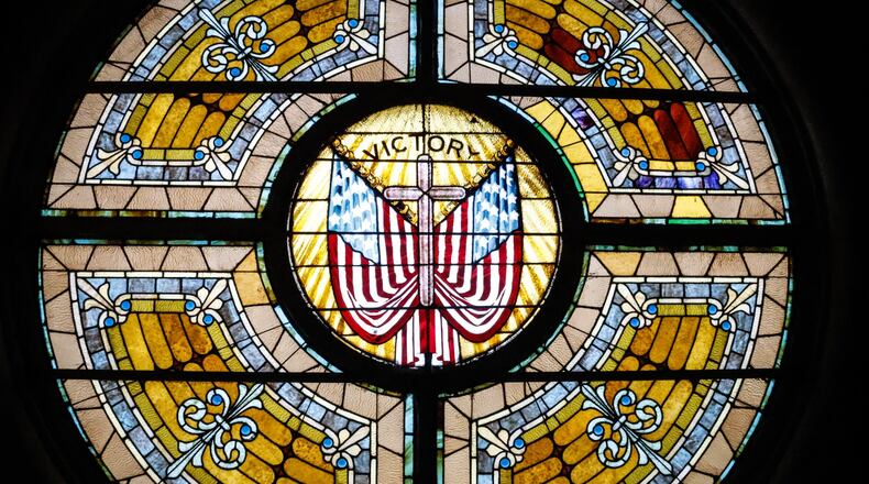 One of the many beautiful stained glass windows in the Chapel of the Good Shepard on the Dayton V.A. grounds. JIM NOELKER/STAFF