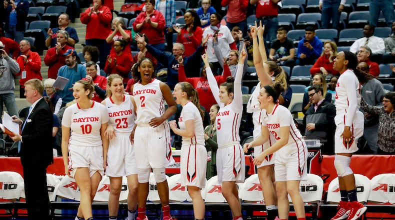 Dayton’s players celebrate their lead over Duquesne in the Atlantic 10 women’s NCAA college basketball championship game in Richmond, Va., Sunday, March 5, 2017. (Daniel Sangjib Min/Richmond Times-Dispatch via AP)