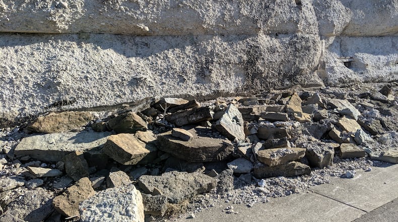 The retaining wall below Dayton-Cincinnati Pike/North Dixie Highway that was built more than 100 years ago is in need of rehabilitation and/or repair. A plan to replace a section of crumbling wall is expected to close a section of road at the Warren County-Montgomery County line for several months next year and realign it. FILE