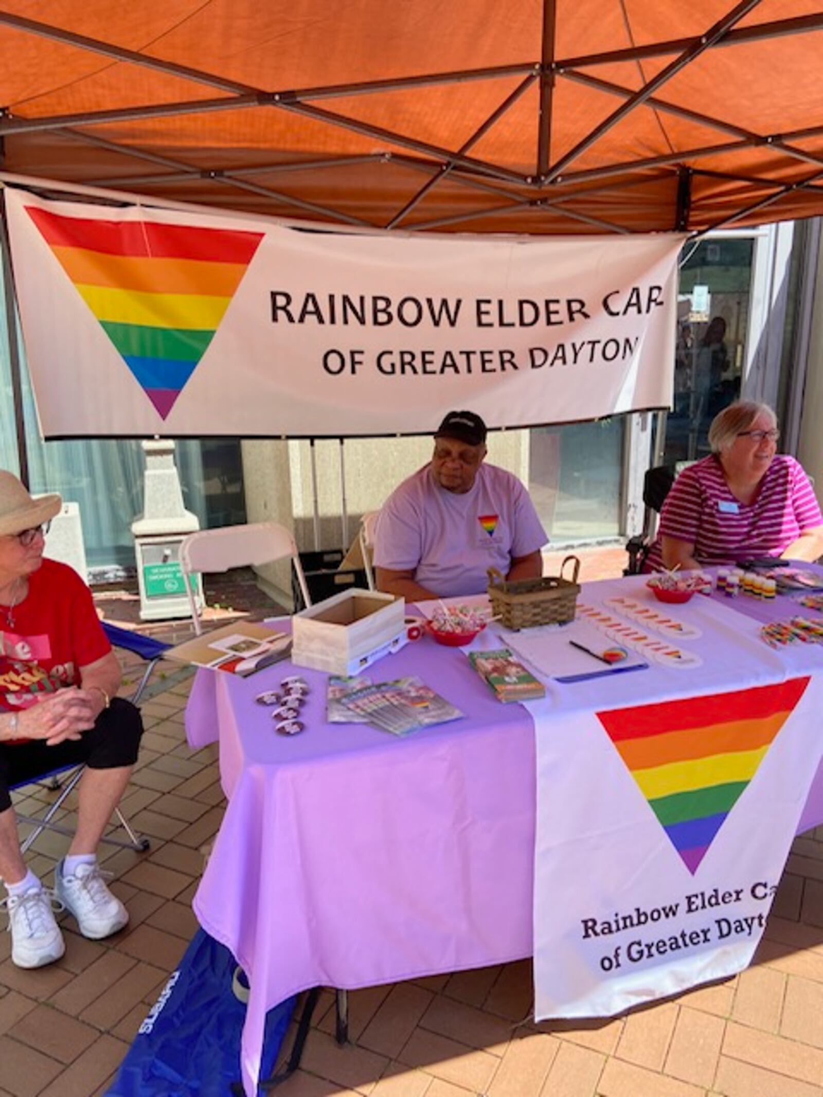Members of the REC board staff our booth at a recent Dayton Pride. CONTRIBUTED