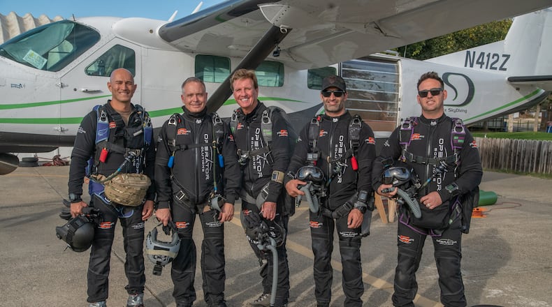 Larry Connor (third from left) recently set a world skydiving record, becoming the oldest human to record a HALO (high altitude, low opening) jump above 25,000 feet. CONTRIBUTED