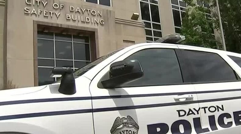 A Dayton police cruiser sits outside the City of Dayton Safety Building. STAFF FILE