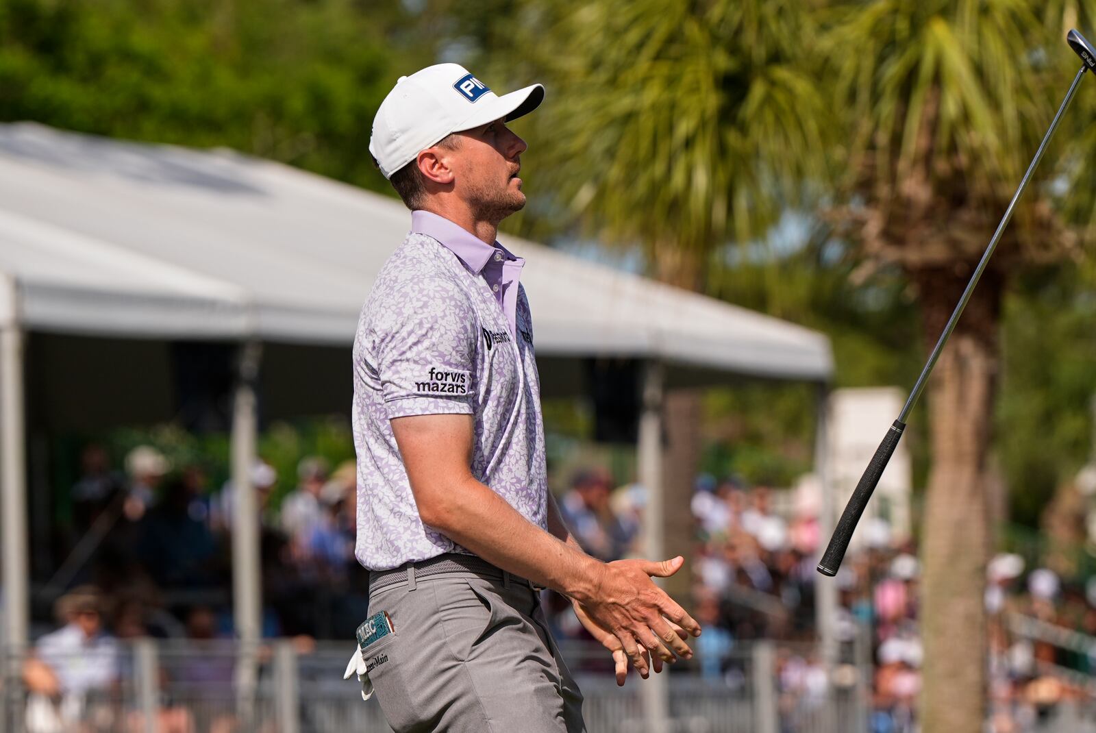 Mackenzie Hughes, of Canada, reacts after missing his putt on the 16th hole during the final round of the RBC Heritage golf tournament, Sunday, April 20, 2025, in Hilton Head Island, S.C. (AP Photo/Mike Stewart)