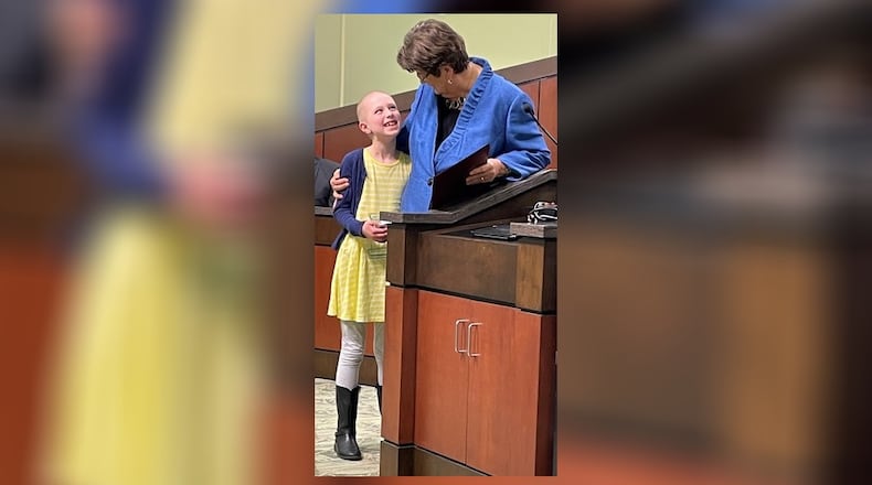 Chloe Adkins became the youngest recipient ever of the Kettering mayor’s volunteer award when Peggy Lehner presented it to her earlier this month. CONTRIBUTED