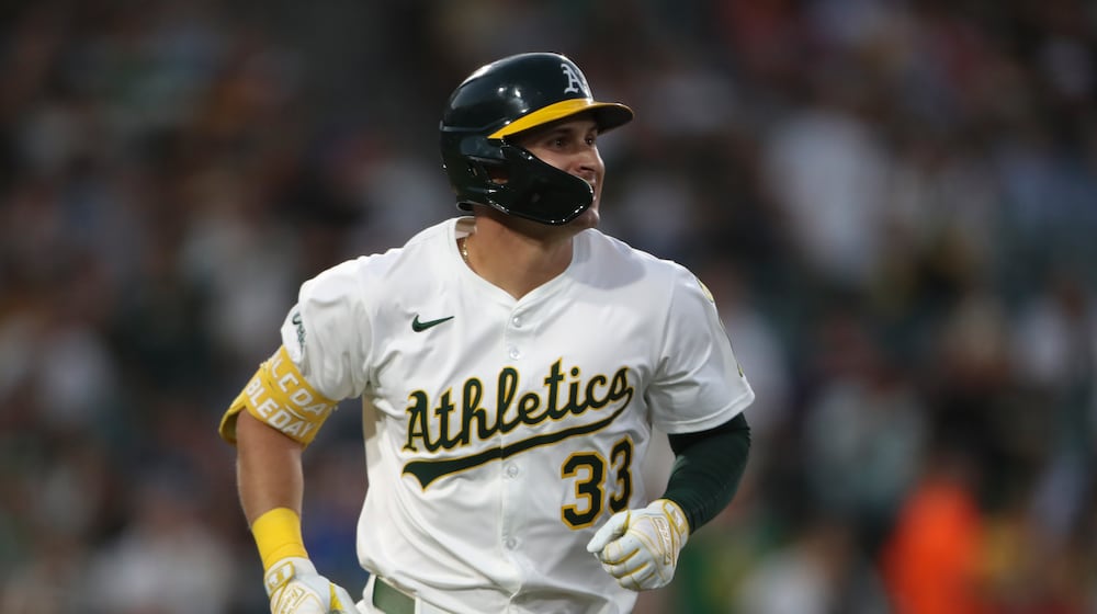 Athletics' JJ Bleday jogs to first base after hitting a solo home run against the Houston Astros during the fifth inning of a baseball game Monday, June 16, 2025, in West Sacramento, Calif. (AP Photo/Scott Marshall)