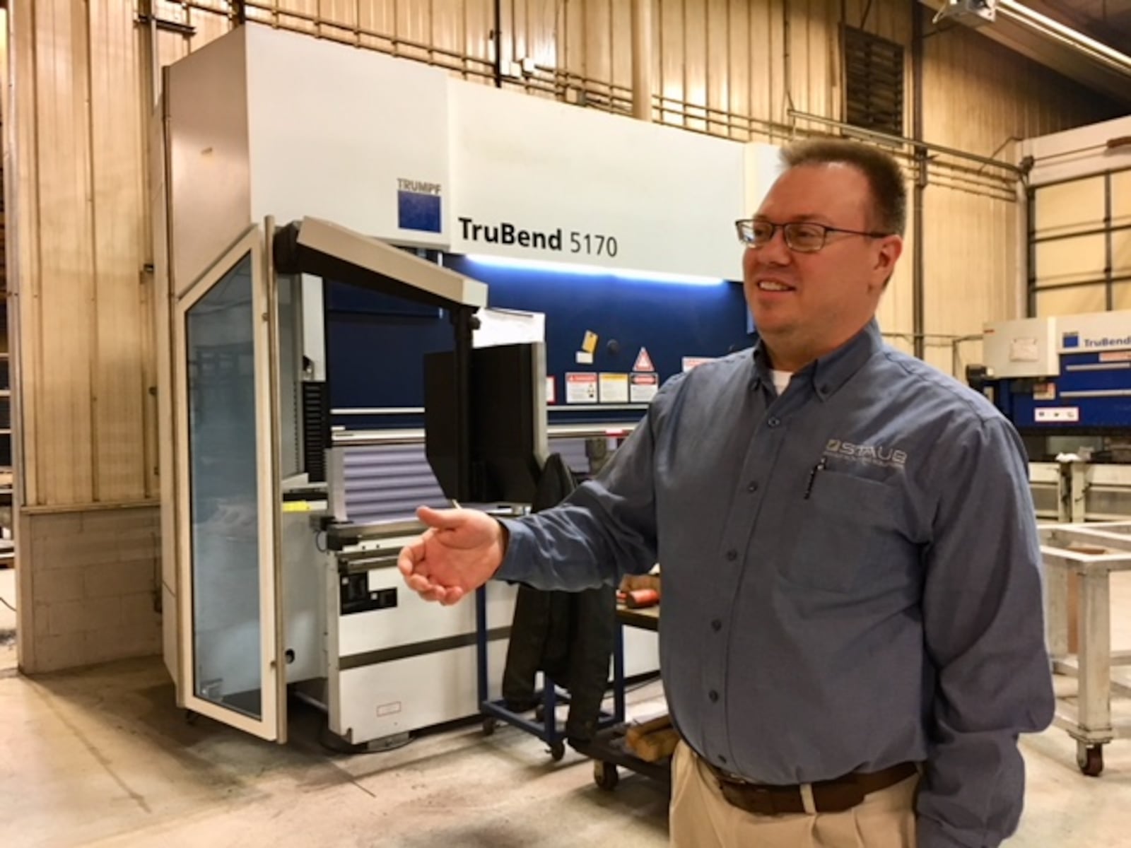 Steve Staub, president and co-owner of Staub Manufacturing Solutions of Dayton, in the plant. THOMAS GNAU/STAFF