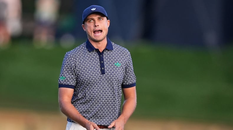 Ludvig Aberg of Sweden reacts after missing a putt on the 17th green during the third round of The Players Championship golf tournament Saturday, March 14, 2026, in Ponte Vedra Beach, Fla. (AP Photo/Gerald Herbert)