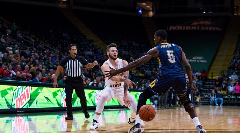 Wright State’s Bill Wampler fires a pass against Kent State during Saturday night’s game at the Nutter Center. Joseph Craven/WSU Athletics