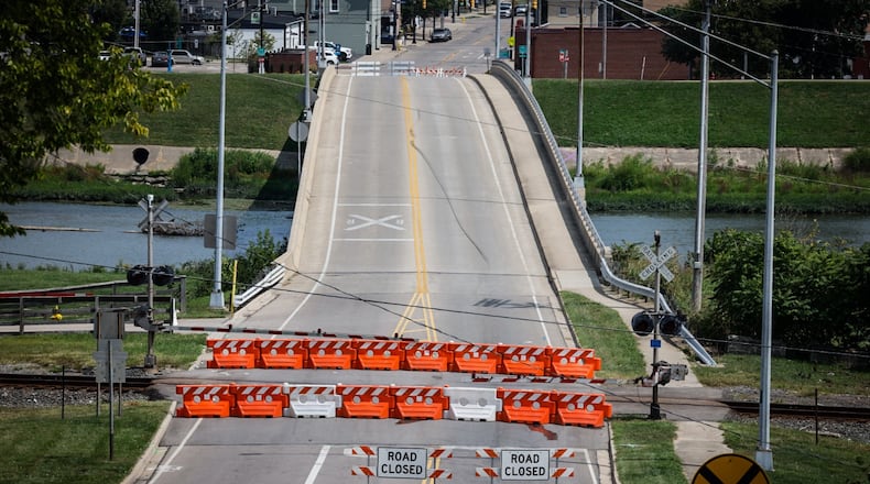The Linden Avenue bridge is still closed Monday, Aug. 19, 2024, after a police chase and a crash into a train on Friday. It appears the railroad gate was damaged in the crash. City officials said the bridge would be closed until further notice. JIM NOELKER/STAFF