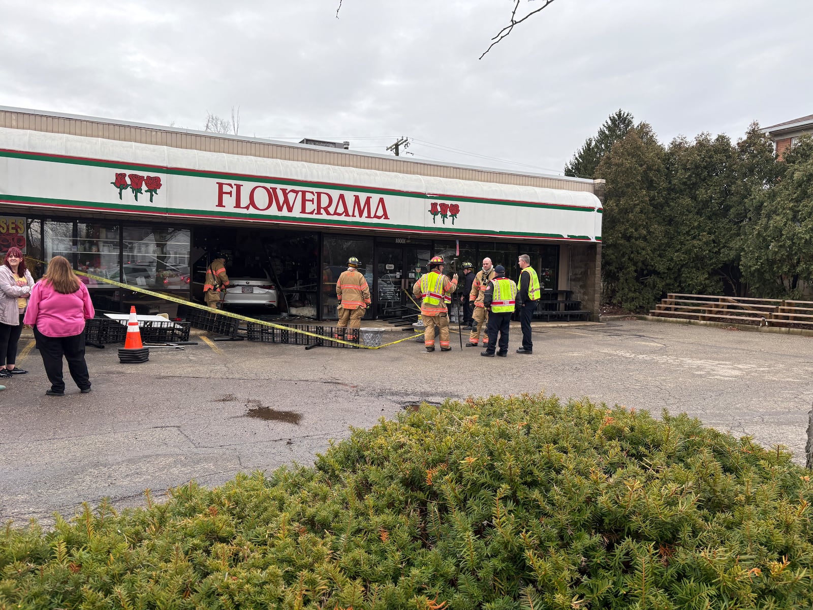 Emergency crews work after a car crashed into Flowerama, 3000 Shroyer Road in Kettering on Thursday, March 5, 2026. JEN BALDUF / STAFF