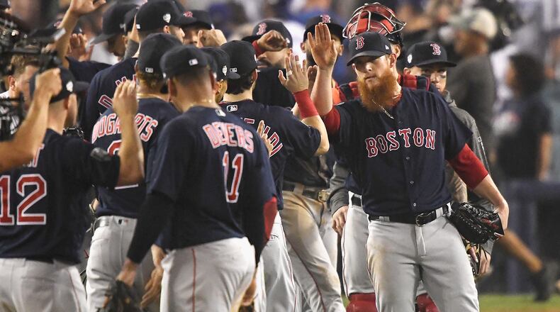 LOS ANGELES, CA - OCTOBER 27: Closing pitcher Craig Kimbrel #46 of the Boston Red Sox celebrates with his teammates after they defeated the Los Angeles Dodgers 9-6 in Game Four of the 2018 World Series at Dodger Stadium on October 27, 2018 in Los Angeles, California. (Photo by Kevork Djansezian/Getty Images)