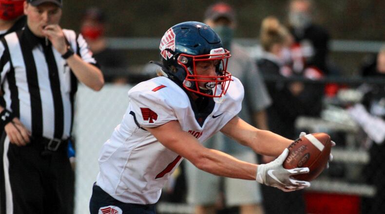 Piqua's Tanner Kemp runs for a touchdown against Tippecanoe on Friday, Sept. 25, 2020, in Tipp City. David Jablonski/Staff