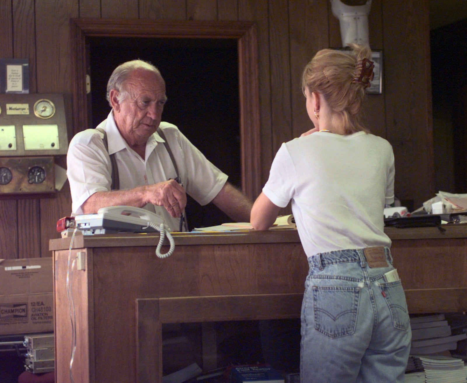 Habersham County Airport operator James Tatum talks with student prospect Christian Tanner. Tanner says she has been saving money to fly and wants to start soon - even though her husband doesn't know it yet. 1997
