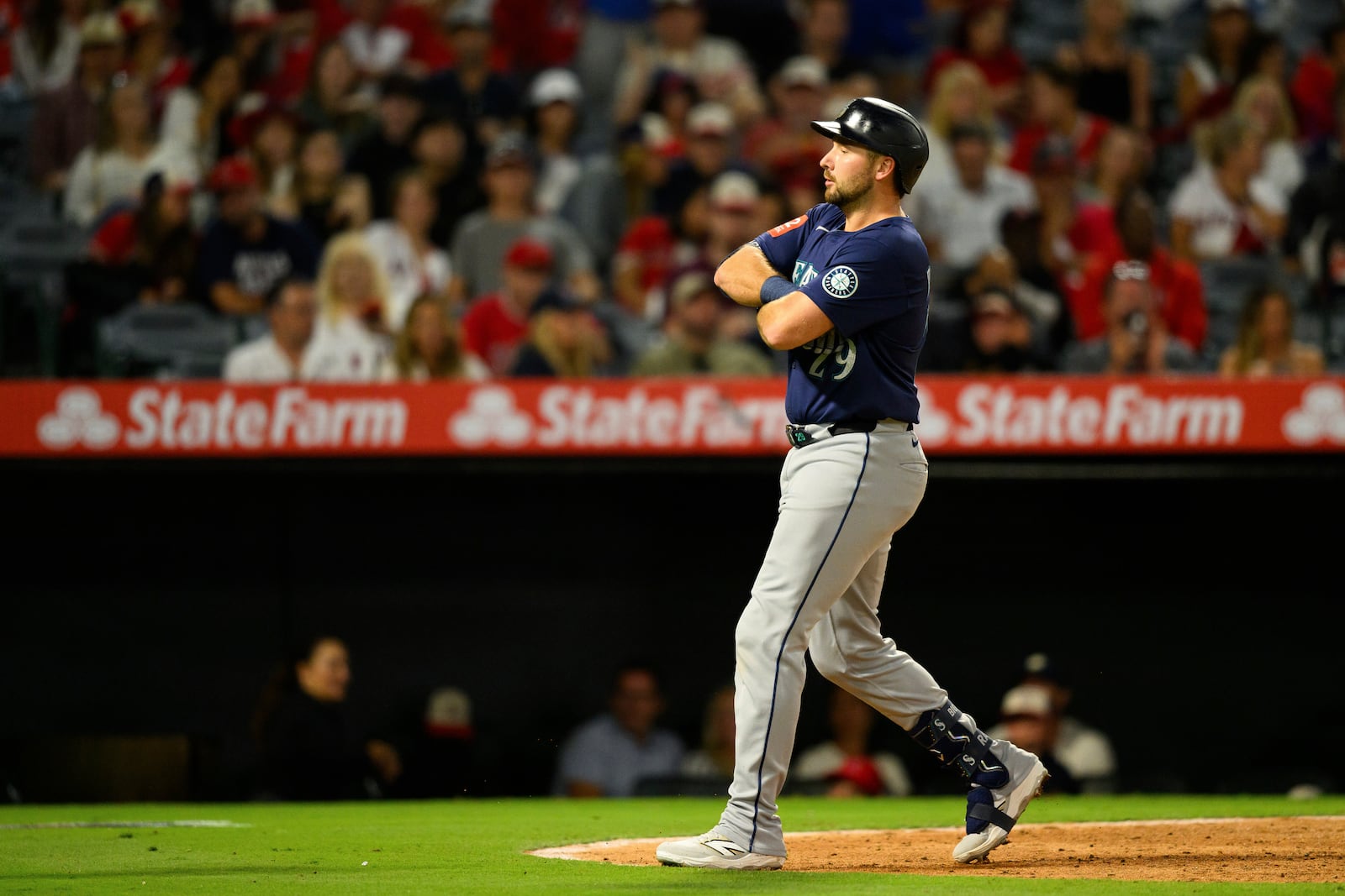 Seattle Mariners' Cal Raleigh gestures after hitting a home run during the sixth inning of a baseball game against the Los Angeles Angels, Saturday, July 26, 2025, in Anaheim, Calif. (AP Photo/William Liang)