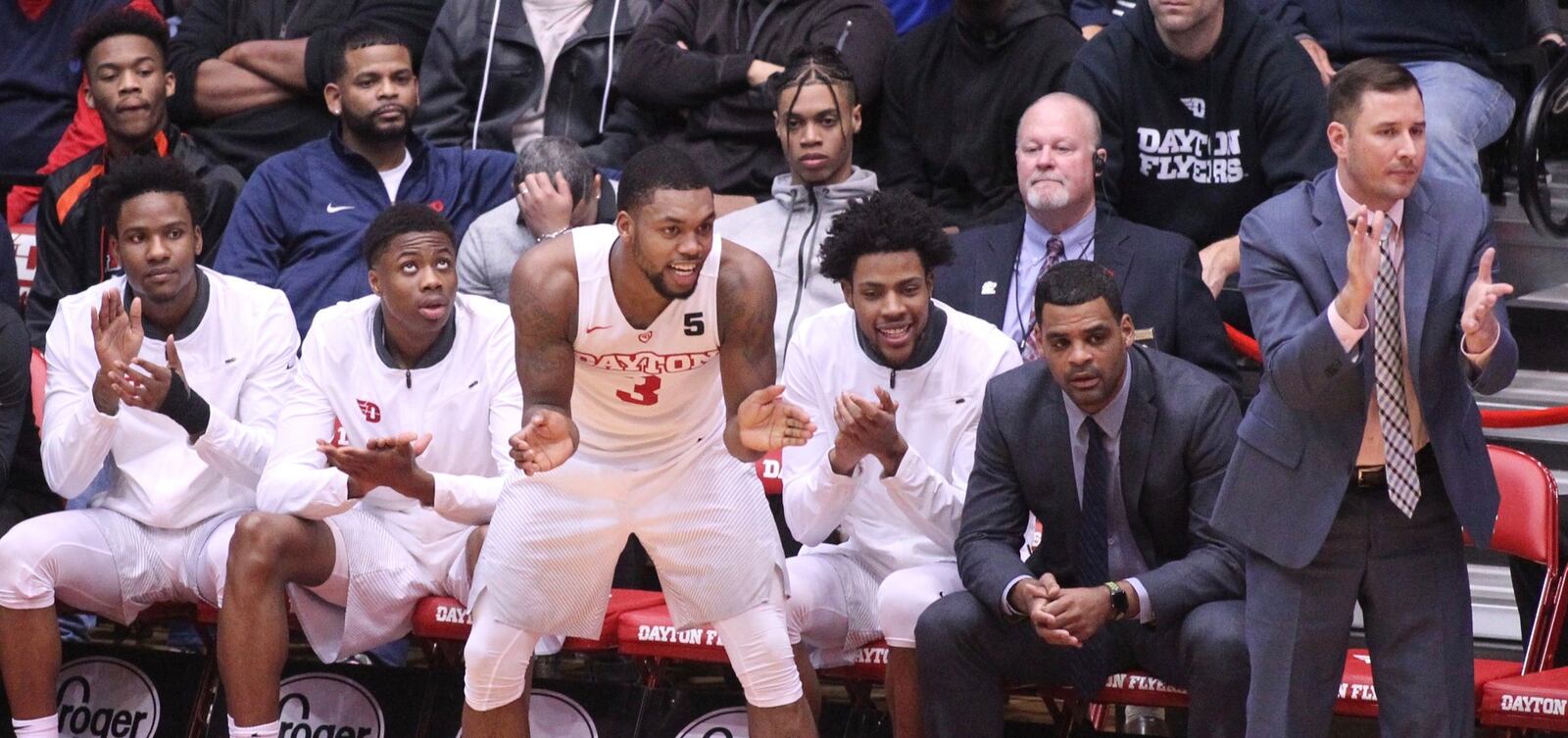 Dayton’s Trey Landers claps during a game against Fordham on Saturday, Feb. 17, 2018, at UD Arena. Behind Landers and to the right is Jhery Matos, a junior college recruit who committed to Dayton on Sunday. David Jablonski/Staff
