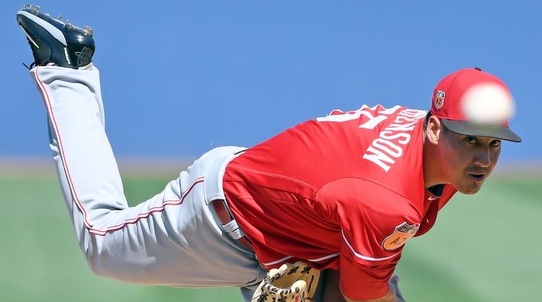 LAS VEGAS, NV - MARCH 25: Robert Stephenson #55 of the Cincinnati Reds pitches against the Chicago Cubs during their exhibition game at Cashman Field on March 25, 2017 in Las Vegas, Nevada. The Cubs won 11-7. (Photo by Ethan Miller/Getty Images)
