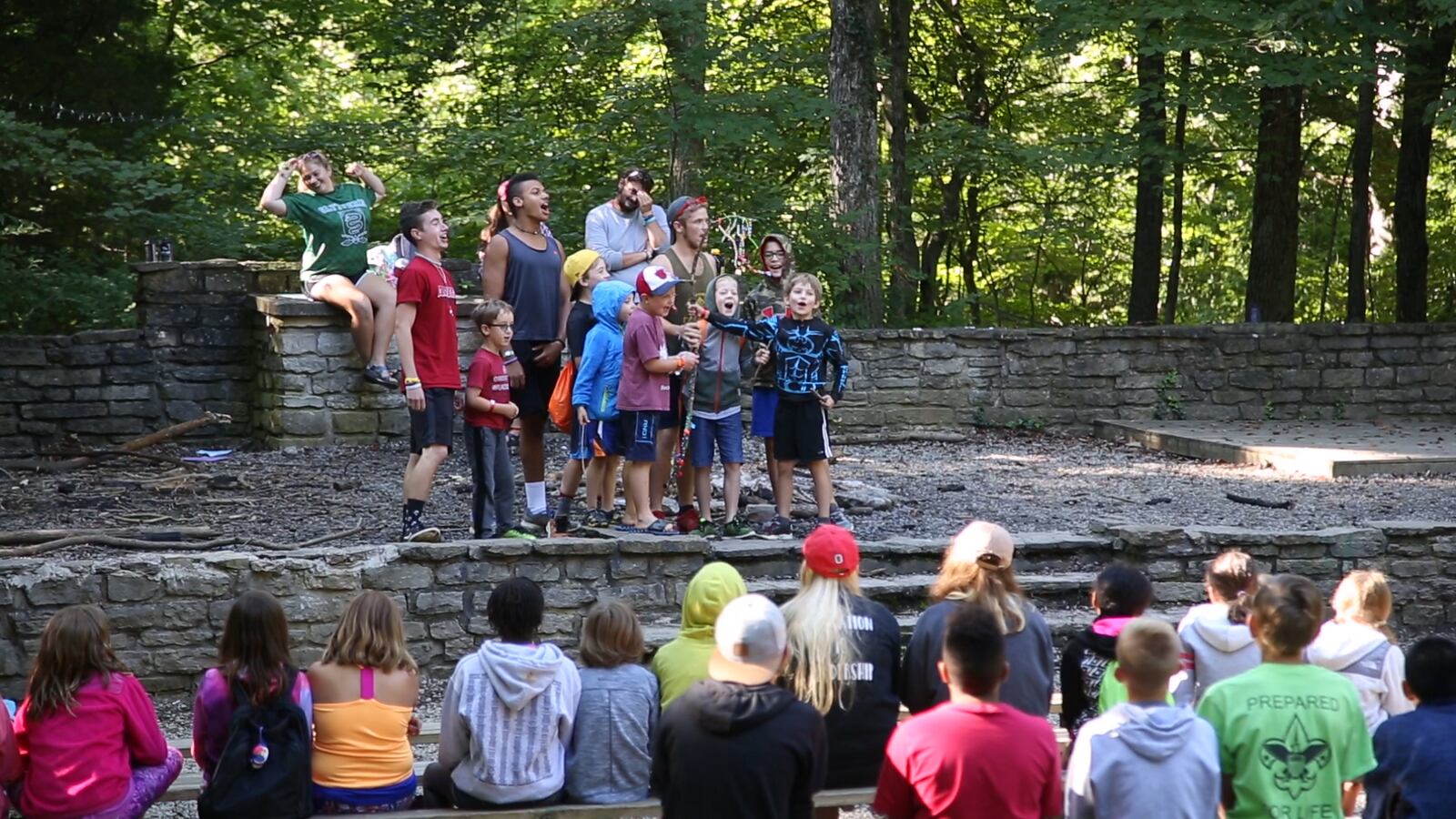 Campers assemble before daily activities start. Surrounded by a mature hardwood forest, the nearly 500-acre Greater Dayton YMCA Camp Kern sits atop a ridge above the Little Miami River in Warren County.   TY GREENLEES / STAFF