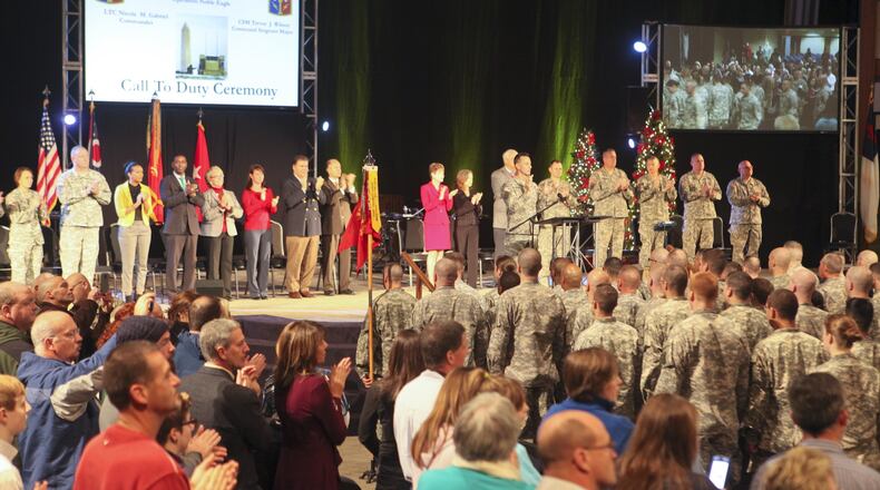 In this 2014 file photo, members of the 1st Battalion, 174th Air Defense Artillery Regiment, Task Force Shiloh, prepared to send over 200 guardsmen on the homeland defense mission known as Operation Noble Eagle in Washington D.C. A deployment ceremony was held for them at Tri County Assembly of God in Fairfield, Saturday, Dec. 6, 2014. GREG LYNCH / STAFF