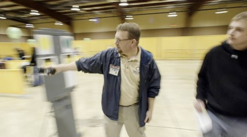 File - People pictured receiving H1N1 flu vaccinations Nov. 12, 2009 at the former Hara Arena complex at a Public Health - Dayton & Montgomery County clinic. The 2009-2010 H1N1 flu pandemic is an example of where Public Health had volunteers from its region of the Ohio Medical Reserve Corps provide support. Public Health is currently looking for more volunteers for its Medical Reserve Corps region to build up its base of volunteers after losing some volunteers after the COVID-19 pandemic. STAFF FILE