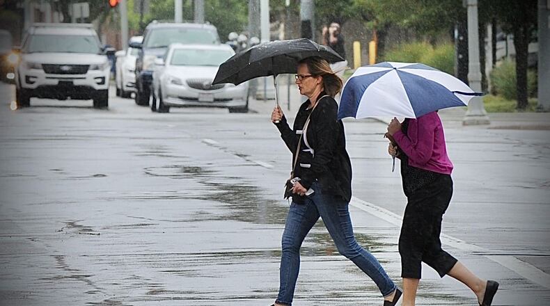 Cool and rainy weather moved into the Dayton area Wednesday morning, Sept. 22, 2021.  MARSHALL GORBY\STAFF