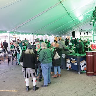 St. Patrick's Day festivites at Dublin Pub began at 5:30 a.m. on Tuesday, March 17. The pub's annual celebration, which includes an area of Wayne Avenue being blocked off, is billed as "Ohio's largest," St. Patrick's Day celebration. BRYANT BILLING / STAFF
