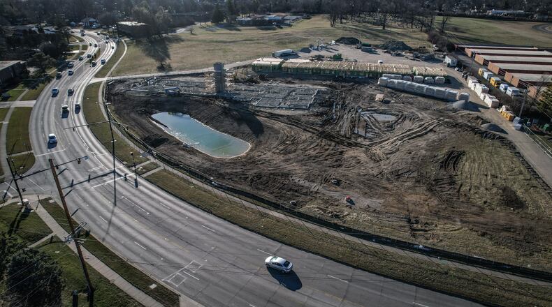 Work continues on the Lofts at Kettering Town Center and the Senior Village at Kettering Town Center on Woodman Drive in Kettering. JIM NOELKER/STAFF