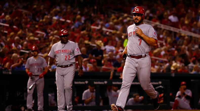 ST. LOUIS, MO - JULY 13:  Eugenio Suarez #7 of the Cincinnati Reds scores a run against the St. Louis Cardinals in the eighth inning at Busch Stadium on July 13, 2018 in St. Louis, Missouri.  (Photo by Dilip Vishwanat/Getty Images)