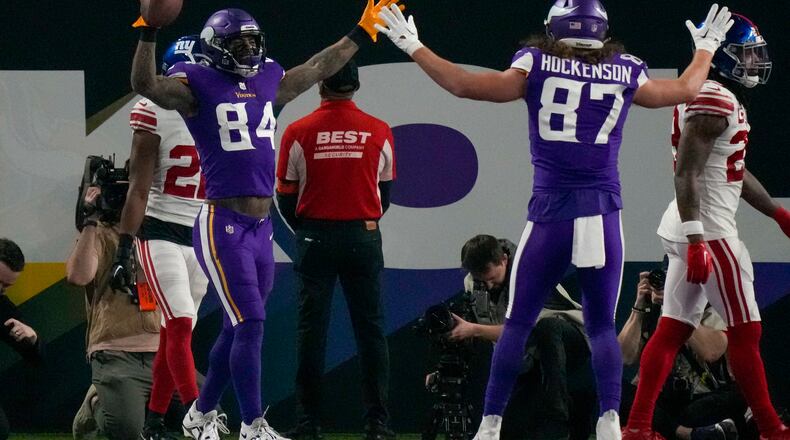 Minnesota Vikings' Irv Smith Jr. celebrates after catching a touchdown pass during the second half of an NFL wild card football game Sunday, Jan. 15, 2023, in Minneapolis. (AP Photo/Charlie Neibergall)