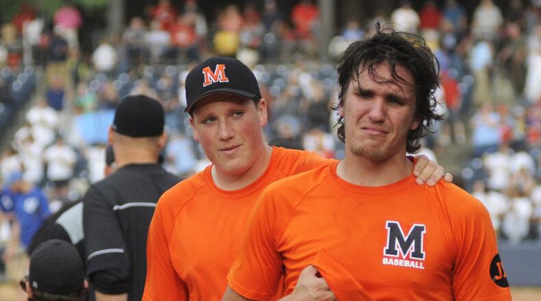 Minster junior pitcher Austin Brown (right) lost 1-0 to Hillsdale in a D-IV baseball state semifinal at Akron’s Canal Park on Friday, June 7, 2019. MARC PENDLETON / STAFF
