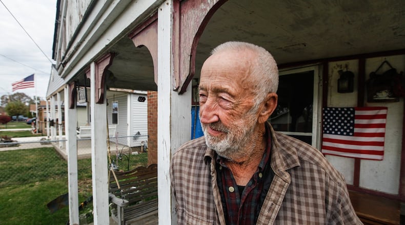 Elmo Blanken’s Ome Avenue home was uninsured against the EF4 tornado’s damage, which took out some windows that remain covered with only tarps as temperatures reach freezing. CHRIS STEWART / STAFF