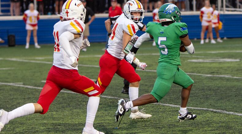 Chaminade Julienne wingback Aiden Lowery runs for 60 yards to set up the Eagle' first touchdown Thursday night against Fenwick. Jeff Gilbert/CONTRIBUTED