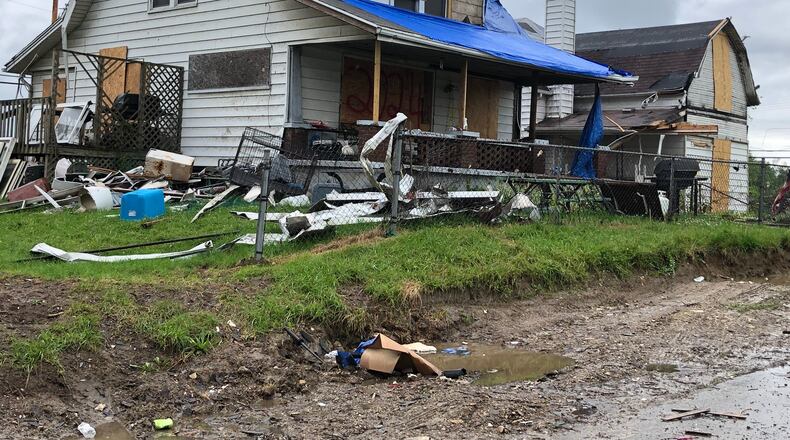 This house was one of many homes and businesses badly damaged in the Northridge section of Harrison Twp. by the Memorial Day tornado. STAFF PHOTO/Lynn Hulsey
