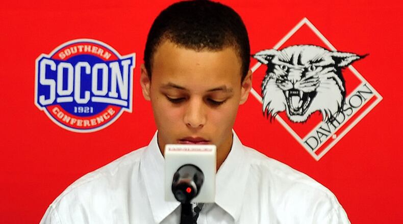 Davidson's Stephen Curry pauses during a news conference where he announced his intent to forego his senior year at Davidson College and enter the NBA draft in Davidson, N.C., on Thursday, April 23, 2009. (Jeff Siner/Charlotte Observer/TNS)