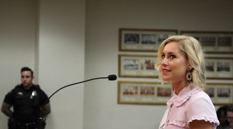 Miss Ohio Caroline Grace Williams urges people to activate Emergency SOS on their phones. CORNELIUS FROLIK /STAFF