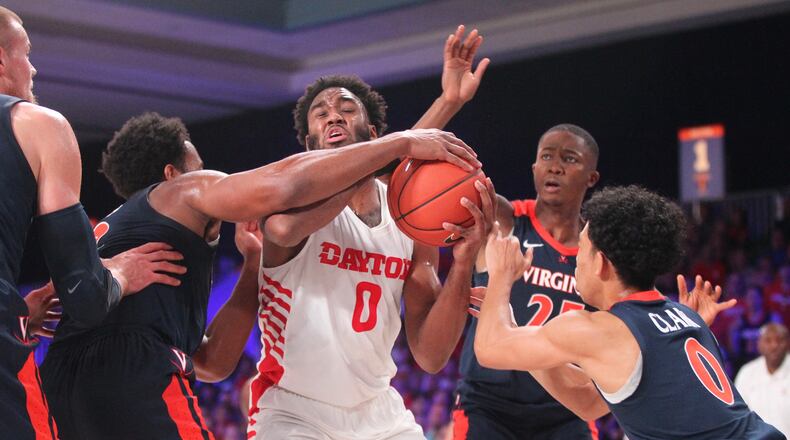 Dayton's Josh Cunningham tries to get off a shot against Virginia in the semifinals of the Battle 4 Atlantis on Thursday, Nov. 22, 2018, at Imperial Gym on Paradise Island, Bahamas.