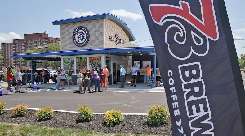 A ribbon cutting ceremony was held for the new Seven Brew location at the intersection of East Main Street and Belmont Avenue in Springfield Tuesday, July 16, 2024. The new Seven Brew is the first in area. It offers hot and cold coffee drinks as well as energy drinks, milk shakes and smoothies. BILL LACKEY/STAFF