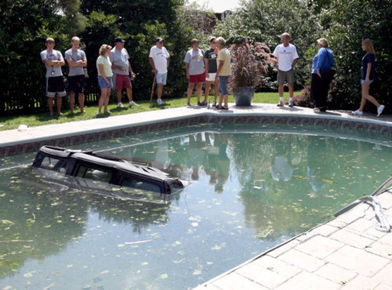 Jeep driven into pool