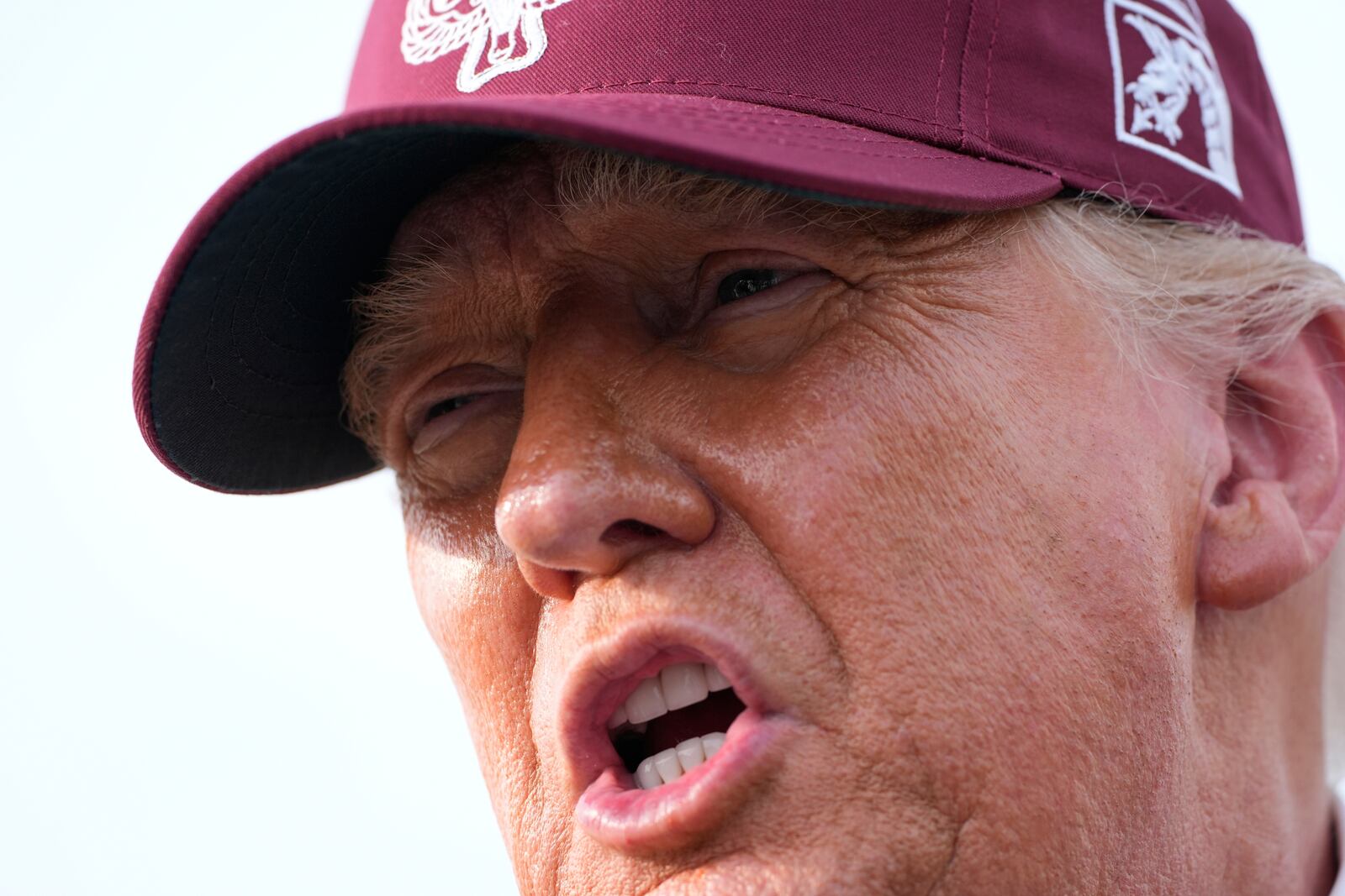 President Donald Trump speaks to reporters after arriving on Air Force One, Tuesday, June 10, 2025, at Joint Base Andrews, Md. (AP Photo/Alex Brandon)