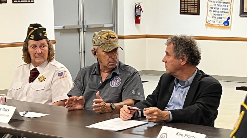 Sen. Sherrod Brown speaks with local veterans regarding about the PACT Act, an expansion of health care benefits for those affected by illnesses related to toxic chemical exposure during their time in the service. AIMEE HANCOCK/STAFF