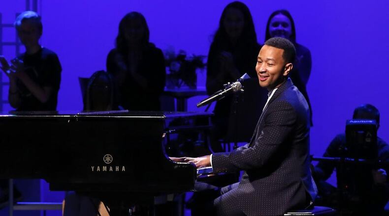 John Legend performs on stage during a concert following the ribbon cutting for the new John Legend Theater in Springfield in October 2016. Bill Lackey/Staff
